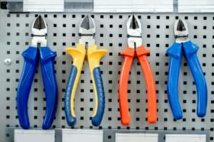 Colorful pliers in a row